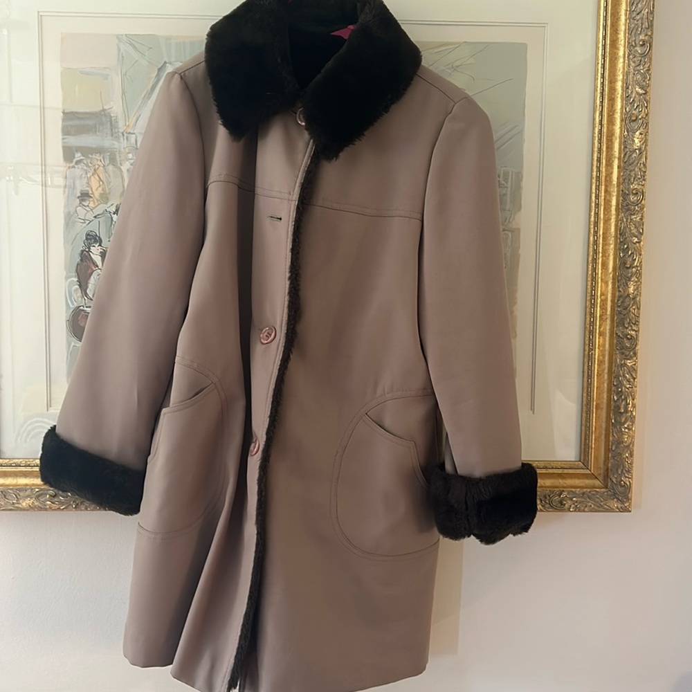 Woman's winter faux fur lined brown coat